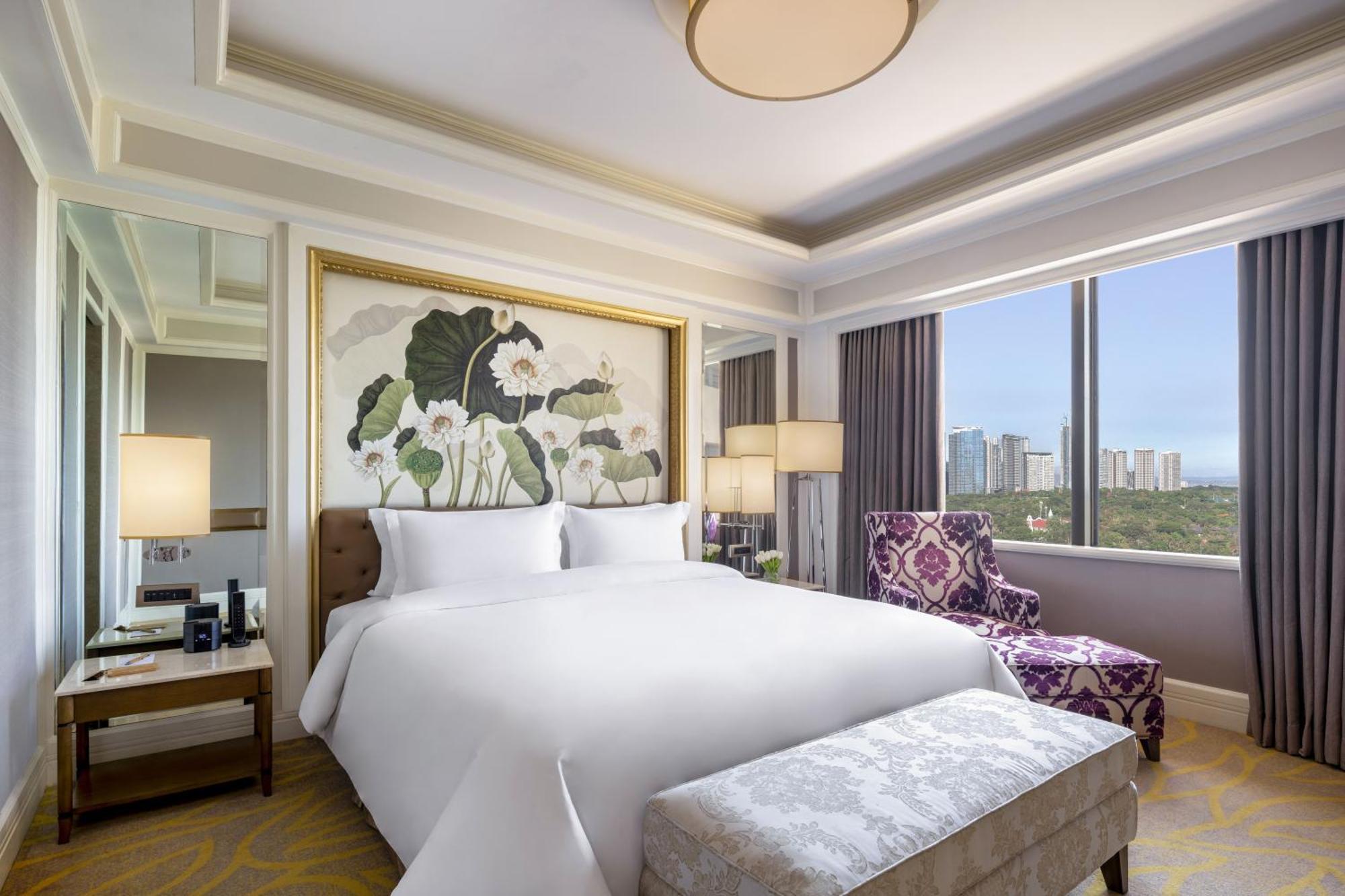 Dusit Thani Manila Makati City Habitación foto A bedroom at the hotel